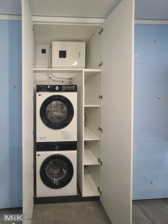 17_Пральна та сушильна машини вбудовані в кухні Пральна та сушильна машини вбудовані в кухні