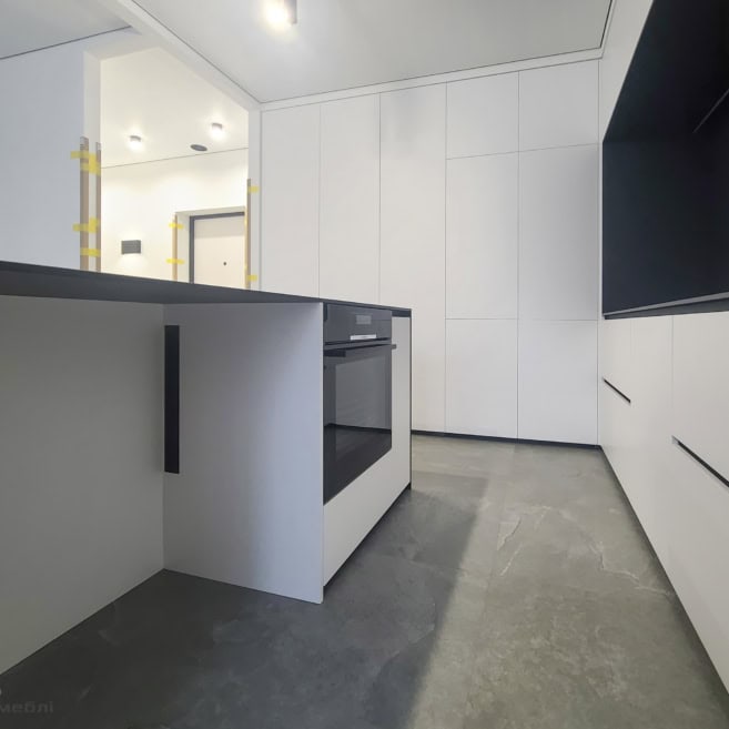 9_Духовка, вбудована в острів білої кухні Духовка, вбудована в острів білої кухні