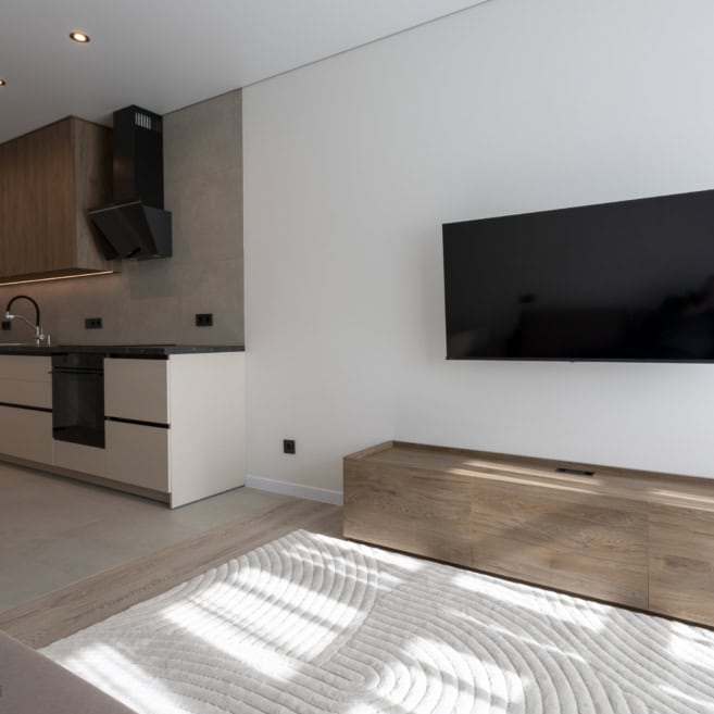 9_pidvisna-tumba-pid-tv-u-kvartyri Кухня и ТВ-зона в квартире в едином стиле на заказ